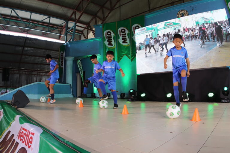 children playing soccer