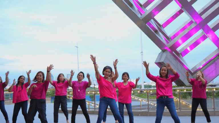 women in pink shirts